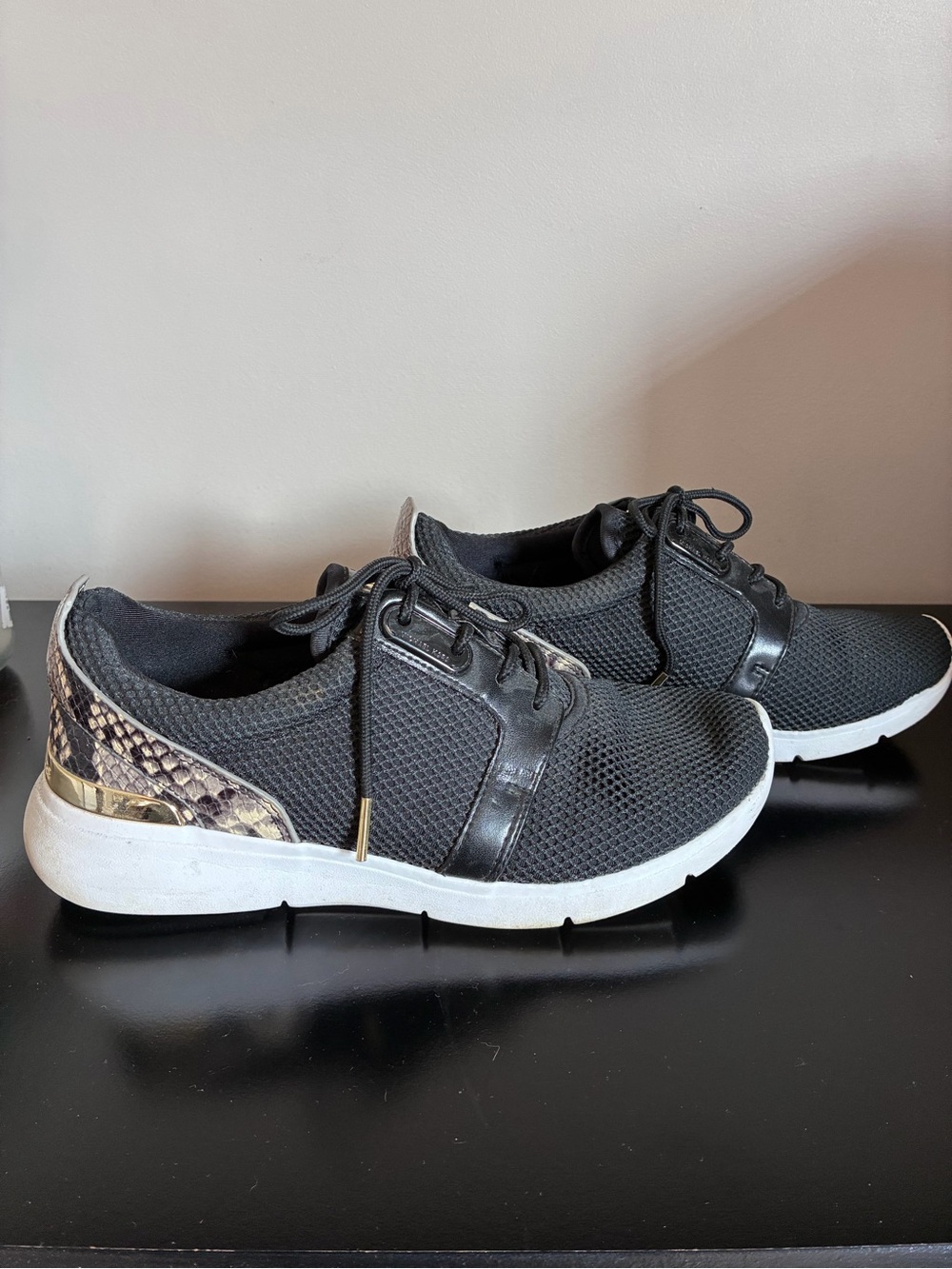 Women's Black Mesh Slip-On Sneakers with Snake-Print Accent